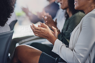Buy stock photo Cropped shot of a group of unrecognizable businesspeople applauding during a seminar in the conference room