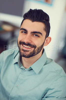Buy stock photo Portrait of a young businessman working at the office
