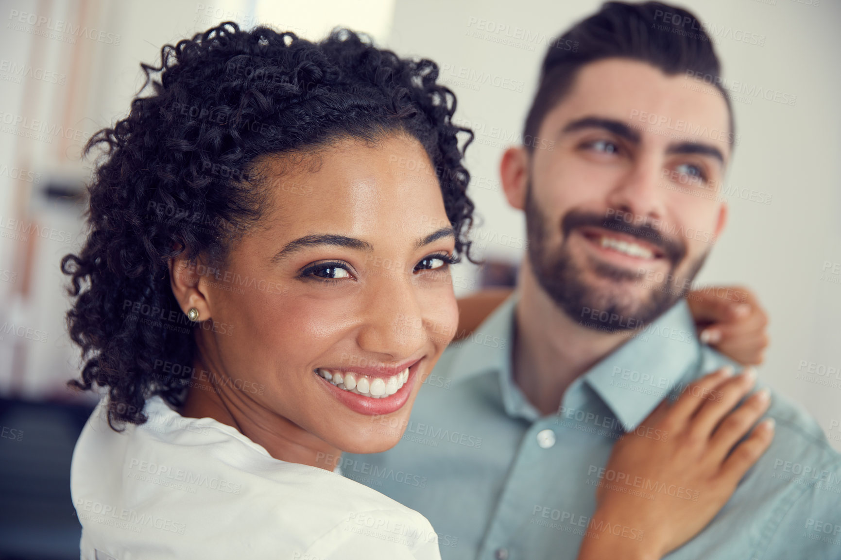 Buy stock photo Cropped shot of a young affectionate couple in the office