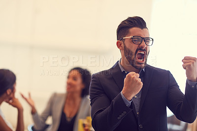 Buy stock photo Cropped shot of a young handsome businessman in the office
