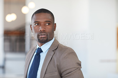 Buy stock photo Portrait of a handsome young businessman in the office