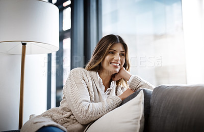 Buy stock photo Woman, home and smile in sofa to relax on day off and leisure. Female person, holiday and happy in living room with thinking or rest on break, chill and self care in couch, lounge and satisfied
