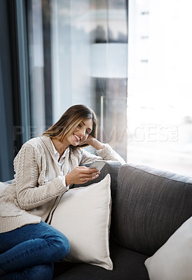 Buy stock photo Relax, phone and girl on sofa laughing at funny meme, gif or social media, comic and reel at home. Smartphone, reading and female person in living room streaming video, movie watching blog in house