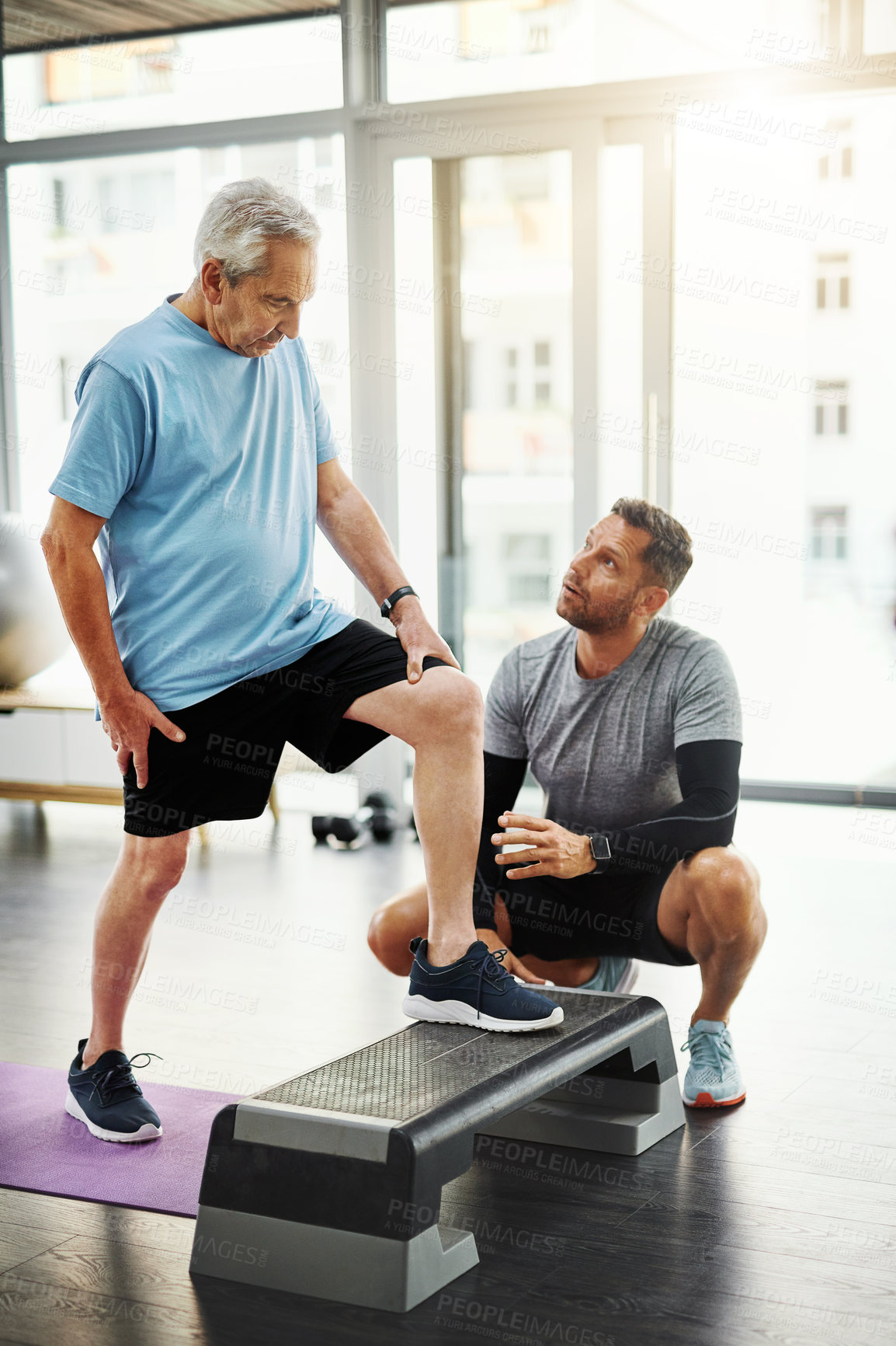 Buy stock photo Step, physiotherapy and man with mature patient for wellness, medical service and consulting. Healthcare, chiropractor and physical therapist with person for rehabilitation, recovery and mobility