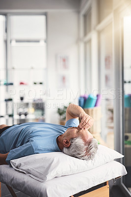 Buy stock photo Shot of a senior man feeling unwell