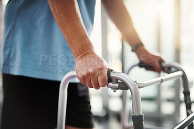 Buy stock photo Closeup shot of a senior man using a walker