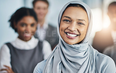 Buy stock photo Portrait of a confident young businesswoman standing inside the office at work