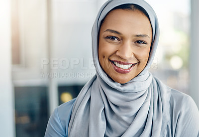 Buy stock photo Portrait of a confident young businesswoman standing inside the office at work