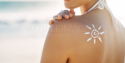 Buy stock photo Woman, sun or lotion on shoulder at beach for skincare, protection or healthy skin on vacation. Person, sunscreen or icon drawing on back for wellness, dermatology or safety for tanning in Bali space