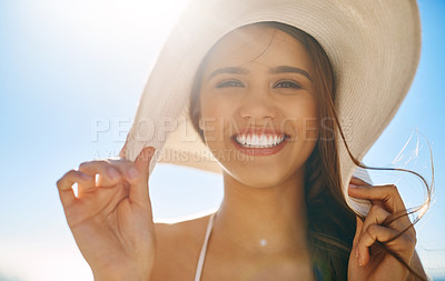 Buy stock photo Closeup shot of a beautiful young woman spending some time at the beach
