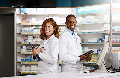 Buy stock photo Portrait of two pharmacists working together in a chemist