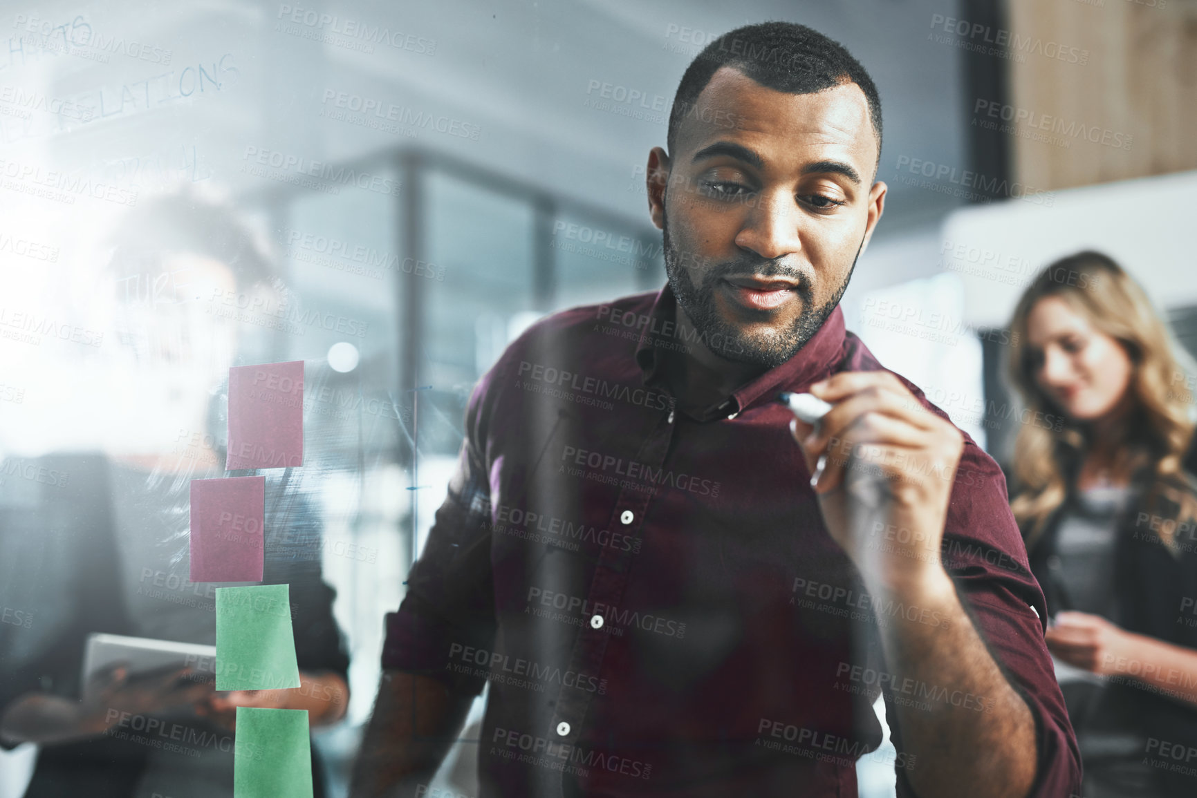 Buy stock photo Sticky notes, writing and man in office, thinking and collaboration of employees for stock market. Discussion, trader and people with ambition, brainstorming and planning for investment opportunity