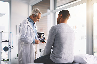 Buy stock photo Doctor, man and patient with tablet for xray consultation of spine anatomy, inflammation and surgery planning. Senior radiologist, digital app and happy with health assessment and medical analysis