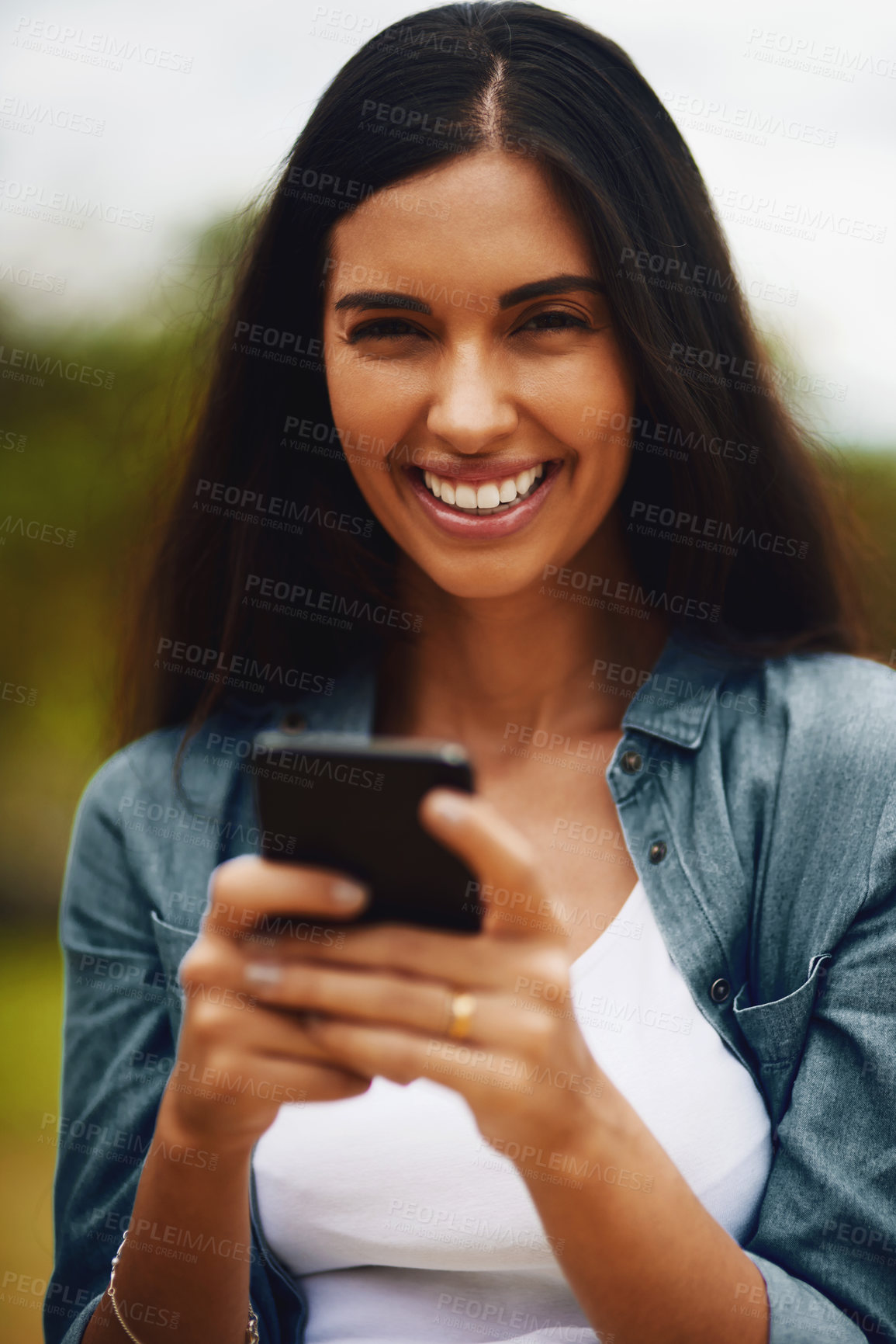 Buy stock photo Portrait, outdoor and woman with smartphone, typing and social media with network, digital app and break. Person, mobile user or girl with cellphone, internet and connection with smile or online joke