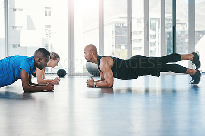 Buy stock photo Fitness, instructor and plank exercise in gym, diversity and people in wellness centre for training and strong abdominal muscles. Coaching, health and support for core workout, active with athletes