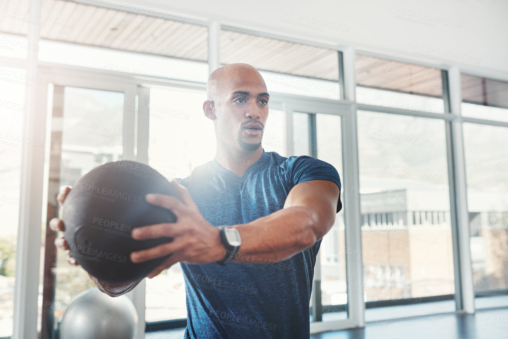 Buy stock photo Training, man and fitness ball in gym for strength, workout and wellness for healthy lifestyle. Sports, black person and exercise for healthcare, resilience and bodybuilder or athlete with balance