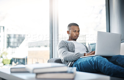 Buy stock photo Man, typing and remote work with laptop in home office on sofa with online research for writing project. Email, communication and creative writer post article to website with fast internet connection
