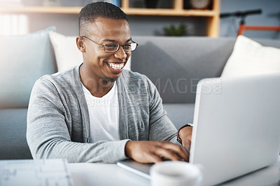 Buy stock photo Laptop, home and African man or student elearning, online course and college or university application or typing in living room. Happy african person on computer for education or scholarship research