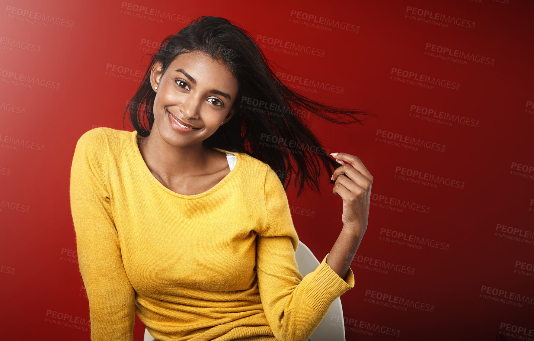 Buy stock photo Studio, portrait and happy woman with casual fashion, relax and positive attitude of female person on mockup space. Smile, face and gen z girl with cool style, confidence and pride on red background