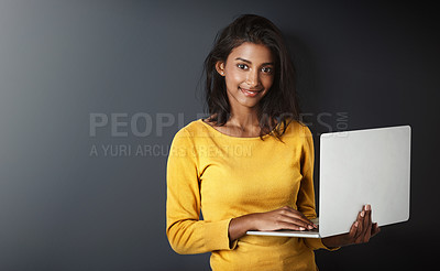 Buy stock photo Woman, student and portrait with a laptop for university and school work with mockup. Isolated, gray background and education work of a young Indian female person with smile and computer for college