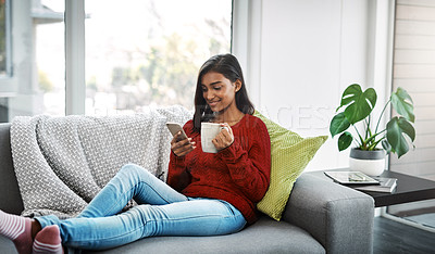 Buy stock photo Relax, home and woman on sofa with tablet for social media, networking or streaming on weekend. Smile, connect and girl on couch with digital app for communication, online chat or search in apartment