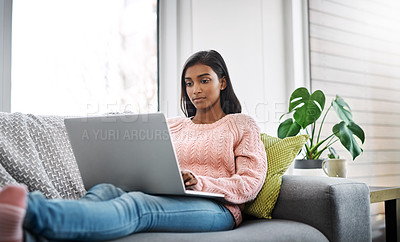 Buy stock photo Relax, home and woman on a couch, laptop and typing with connection, search internet and online reading. Female person, pc and lady on a sofa, technology and chilling with a movie in the living room