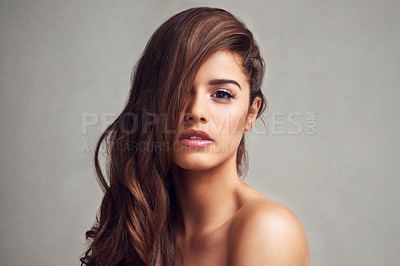 Buy stock photo Beauty, hair and portrait of woman in studio on gray background for keratin, natural or shampoo treatment. Aesthetic, cosmetics and wavy with confident model at salon for conditioning or haircare