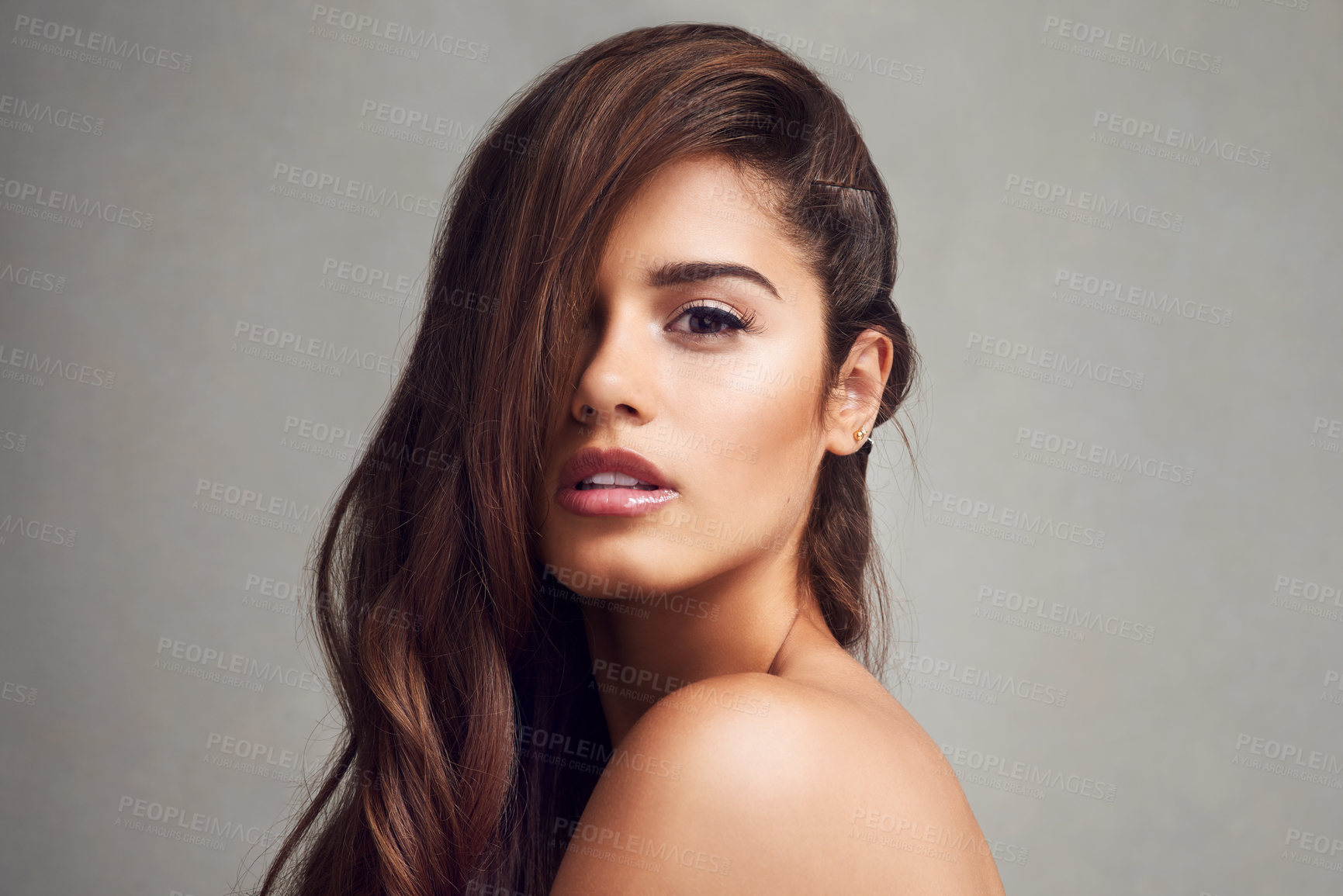 Buy stock photo Aesthetic, hair and portrait of natural woman in studio on gray background for keratin or shampoo treatment. Beauty, cosmetics and wellness with confident model at salon for conditioning or haircare