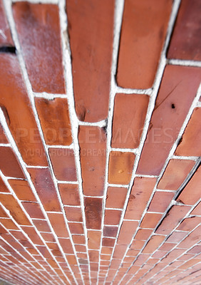 Buy stock photo Perspective closeup of a red brick wall, copy space on home exterior, house or city building. Texture and detail background of strong, solid architecture construction design of facebrick on structure