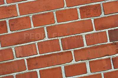 Buy stock photo Closeup of a red brick wall with copy space. Detail of recently built exterior masonry or historic design wall background patterns and textures. Outside zoom of modern industrial style architecture
