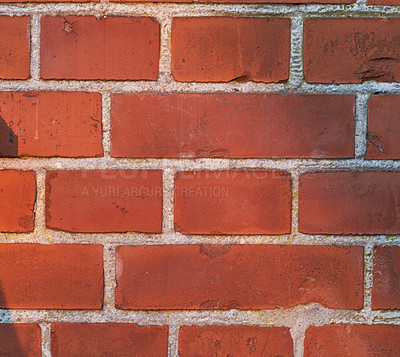 Buy stock photo Closeup of red brick wall and copy space on exterior of a home, house or city building. Texture, detail, copyspace background of rough architecture construction design of facebrick on old structure