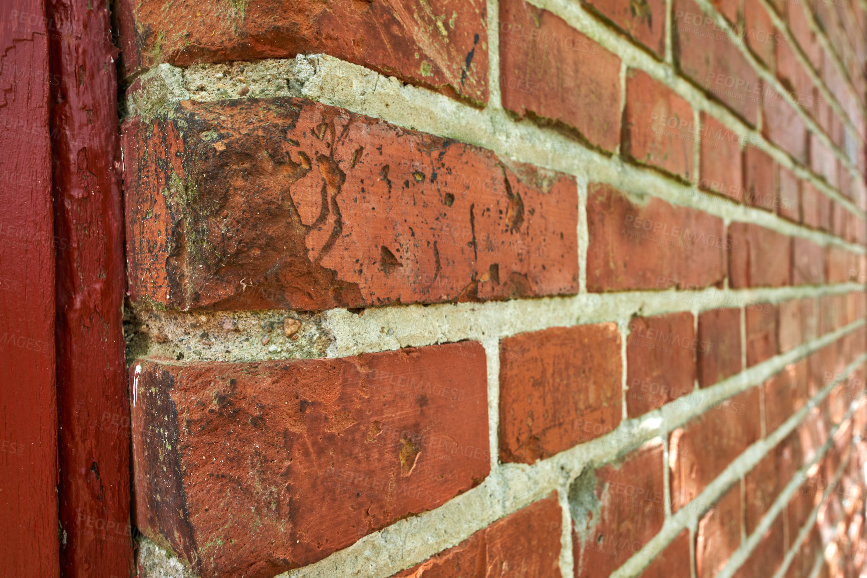 Buy stock photo Closeup of weathered facebrick wall and copy space on exterior of a home, house or city building. Texture and detail background of rough architecture construction design of red brick on old structure