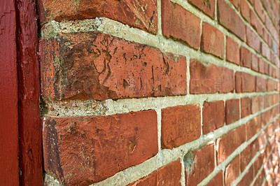 Buy stock photo Closeup of weathered facebrick wall and copy space on exterior of a home, house or city building. Texture and detail background of rough architecture construction design of red brick on old structure