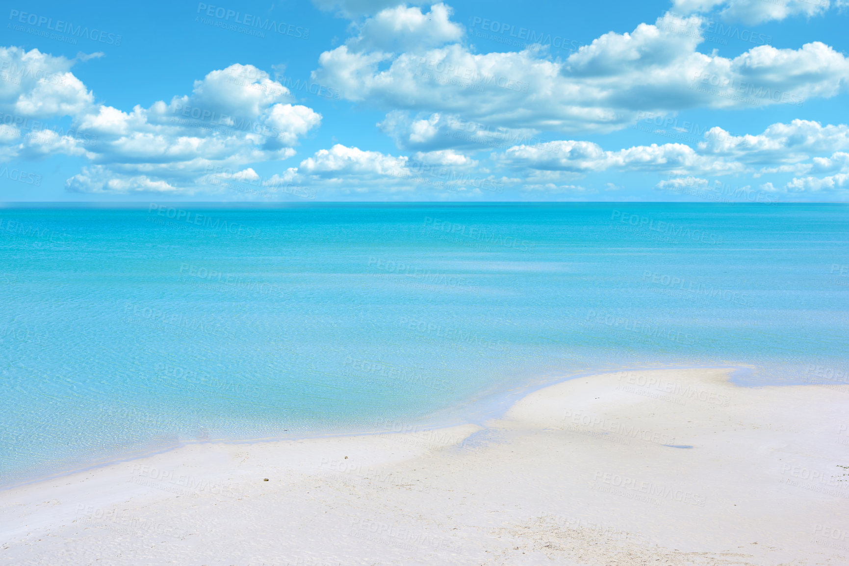 Buy stock photo Copy space at the beach with a cloudy blue sky background above the horizon. Calm ocean water across the sea along the shore. Peaceful and tranquil landscape for a relaxing and zen summer getaway
