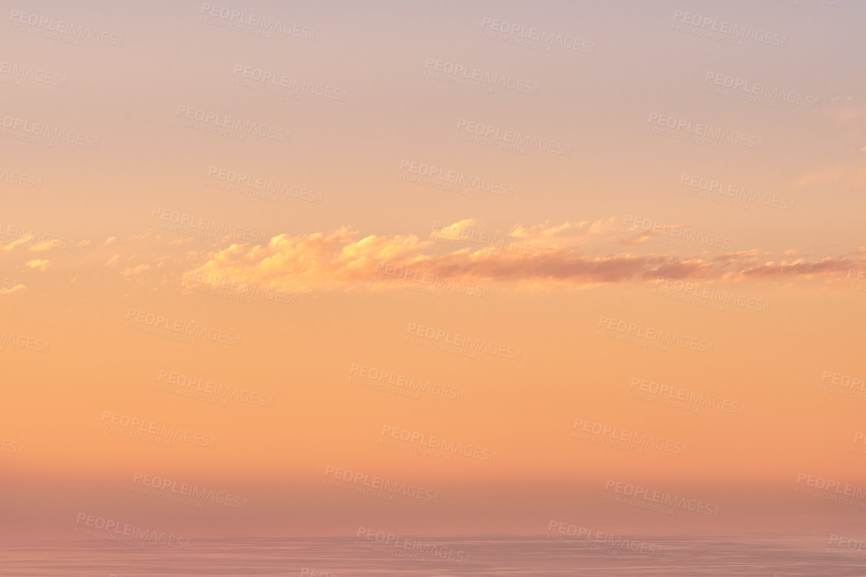 Buy stock photo Seascape copy space with clouds in an orange sunset sky with a copyspace background. Calm, serene, tranquil, peaceful and zen ocean and sea view at dusk. Beautiful scenic mother nature in the evening