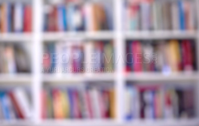 Buy stock photo Copy space, defocused, blurred view of library books or educational reading material on storage shelves in home or learning center. Literature, knowledge, encyclopaedias in school or book shop