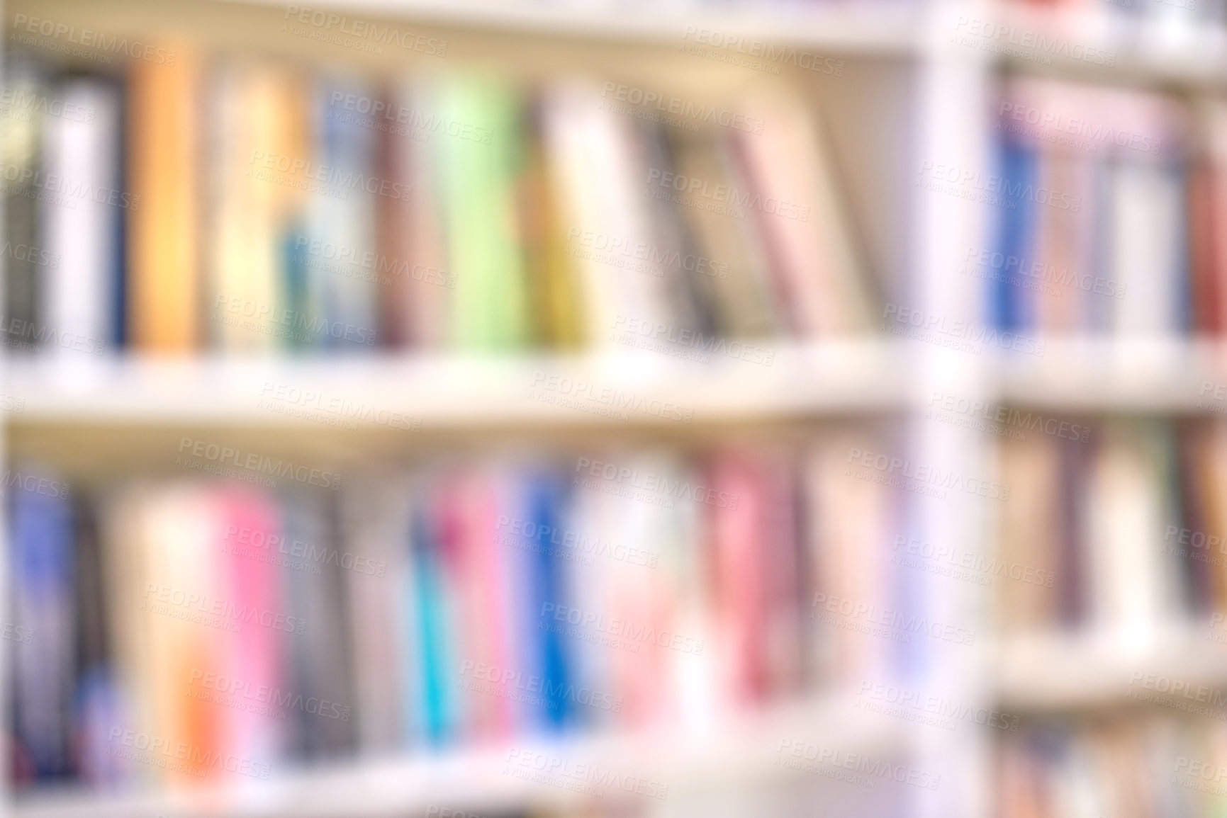 Buy stock photo Blurred background of book shelves in a store or school library for copy space. Defocused view of educational material or fictional entertainment for reading and knowledge in community center or swap