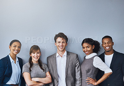 Buy stock photo Cropped portrait of a group of young businesspeople waiting in line for their interviews
