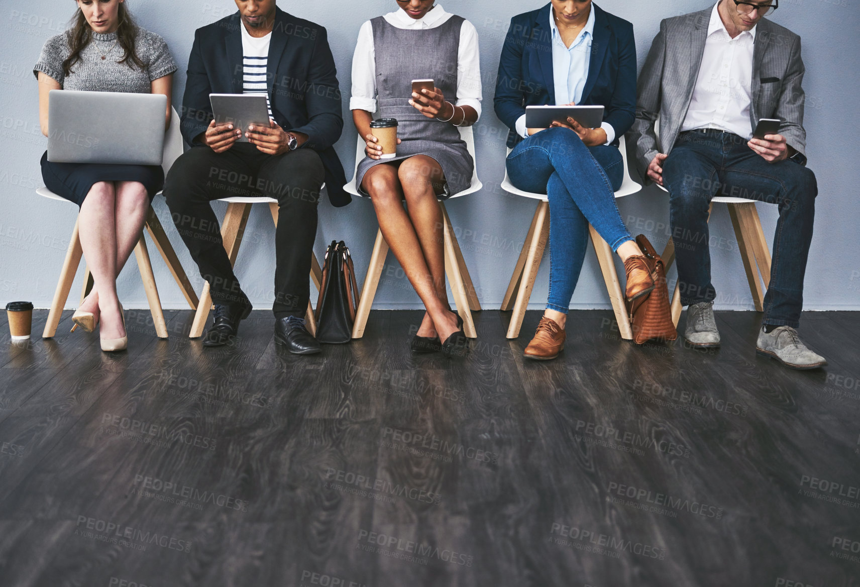 Buy stock photo Technology, hands or business people waiting for interview, job opportunity or hiring app in office. Sign up, floor space or legs of candidates on tablet for employment recruitment or registration
