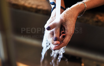 Buy stock photo Woman, water and washing hands in home for hygiene, bacteria prevention and disinfection by sink. Healthcare, person and skin cleaning by faucet in house for germ protection, self care and wellness