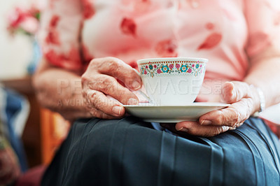 Buy stock photo Hands, tea cup and senior woman in home for relax, comfort and afternoon warm beverage. House, drink and elderly female person in retirement with coffee, cappuccino or latte at assisted living.