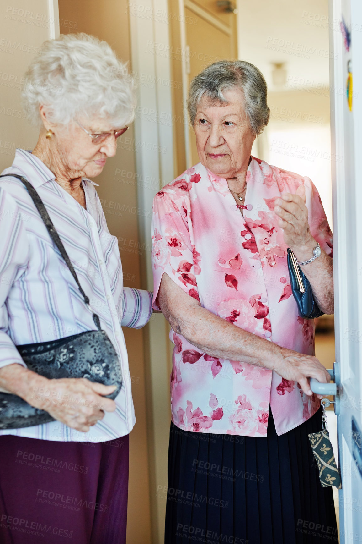 Buy stock photo Leaving, bag and senior women by door in nursing home ready for adventure, visit and going out. Retirement, friends and elderly people with purse in hallway together for bonding, relationship or love