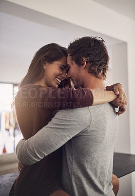 Buy stock photo Happy young couple, love and hug in apartment for care, quality time and bonding together for commitment to relationship. Man, woman and lovers hugging for romance, smile and relax with trust at home
