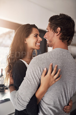 Buy stock photo Happy woman, man and hug in apartment for love, care and quality time together with commitment to relationship. Young couple, hugging and smile for anniversary of lovers, relax and loyalty to partner