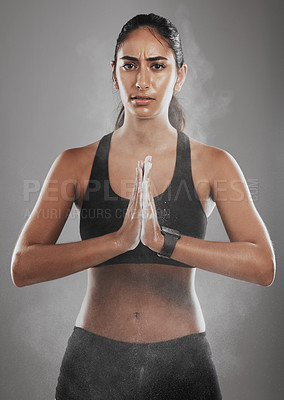 Buy stock photo Cropped shot of a beautiful young woman dusting her hands with talc powder