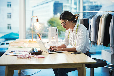 Buy stock photo Fashion designer, woman and typing on laptop in shop for email, project or online order of fabric in creative startup. Serious tailor, computer and small business for clothes or 
textile in boutique