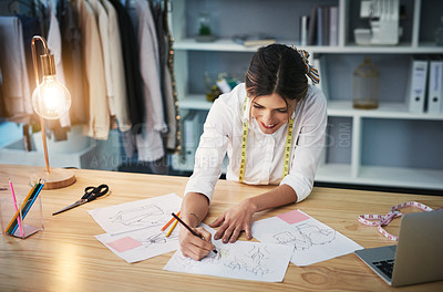 Buy stock photo Tailor, girl and drawing on table, laptop and fashion designer with skills, design and small business. Pencil, entrepreneur and art in workplace, boutique and store for clothes, industry and smile