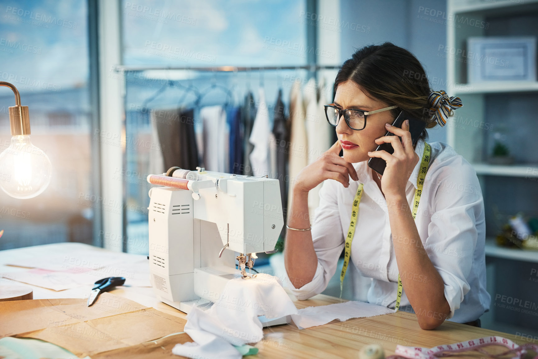 Buy stock photo Woman, phone call or confused of fashion design, business or doubt at question, query or feedback. Seamstress, glasses or smartphone in crm, conversation or planning of new custom designs in office