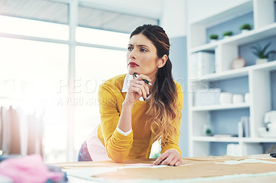 Buy stock photo Woman, fashion and design thinking in studio with paper for creative brainstorming, clothes or small business. Female person, thoughts and workshop wondering for style collection, textile or fabric