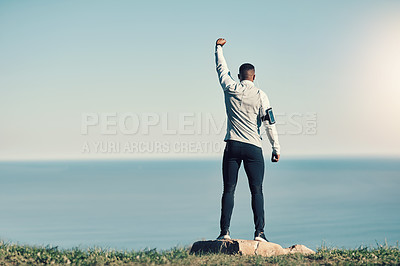 Buy stock photo Black man, ocean and victory with exercise for fitness, healthy lifestyle and morning jog in Atlanta. Hill, back view and celebrate as champion on workout routine, cardio and wellbeing or wellness

